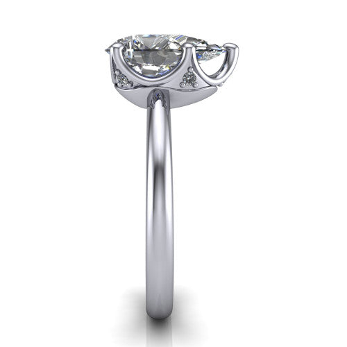 Josie pear east-west solitaire engagement ring in 14K White Gold with plain band, side profile showing the plain band and bezel-set under-gallery accent