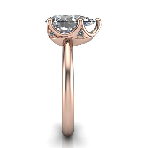 Josie pear east-west solitaire engagement ring in 18K Rose Gold with plain band, side profile showing the plain band and bezel-set under-gallery accent
