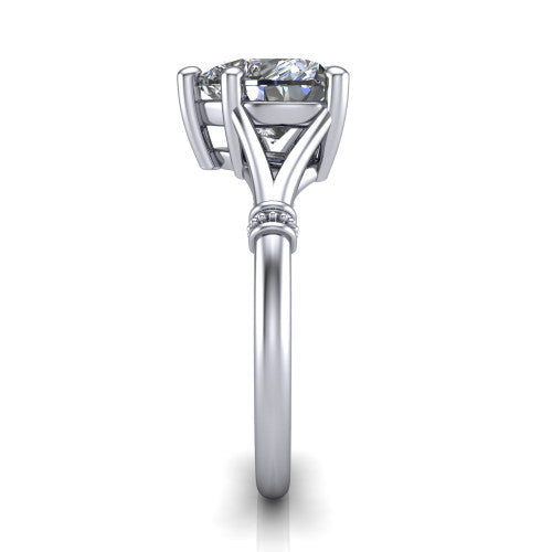 Luna heart classic solitaire engagement ring in Platinum, side profile showing the plain split shank with pavé accent collars rising to the heart center