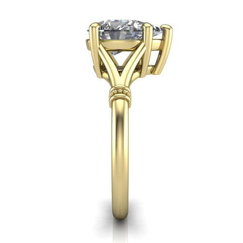 Luna pear classic solitaire engagement ring in 14K Yellow Gold, side profile showing the plain split shank with pavé accent collars rising to the pear center