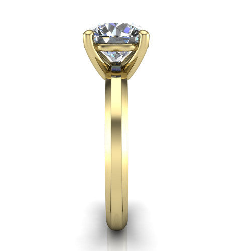 Ellie round classic solitaire engagement ring in 18K Yellow Gold, side profile showing the substantial knife-edge band and the open basket beneath the round center