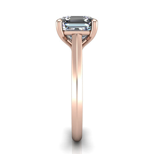 Gianna emerald classic solitaire engagement ring in 14K Rose Gold, side profile showing the plain polished knife-edge band and the open basket beneath the emerald center