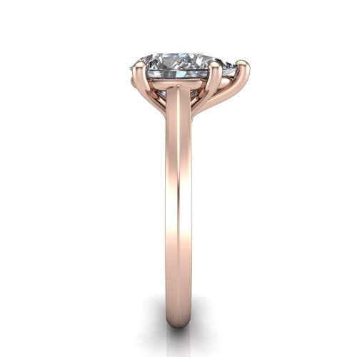 Gianna pear classic solitaire engagement ring in 18K Rose Gold, side profile showing the plain polished knife-edge band and the open basket beneath the pear center