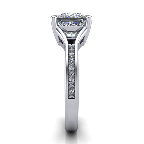 Isla princess classic solitaire engagement ring in 18K White Gold, side profile showing the channel-set pavé split shank with polished edges rising to the princess center