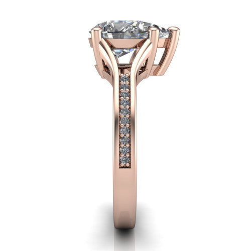 Isla pear classic solitaire engagement ring in 18K Rose Gold, side profile showing the channel-set pavé split shank with polished edges rising to the pear center
