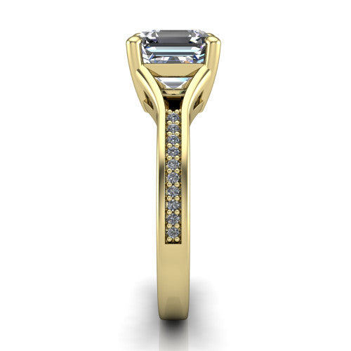 Isla square emerald classic solitaire engagement ring in 14K Yellow Gold, side profile showing the channel-set pavé split shank with polished edges rising to the square emerald center