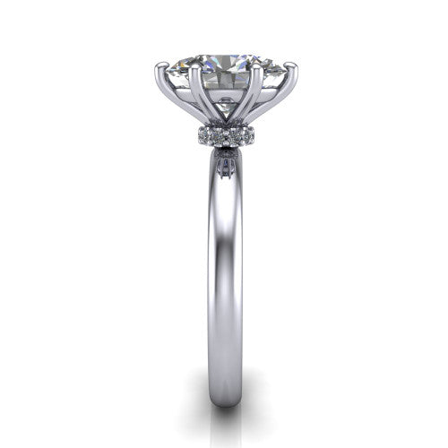 Delilah oval hidden halo engagement ring in Platinum, side profile showing the hidden pavé halo collar and the plain polished band in profile