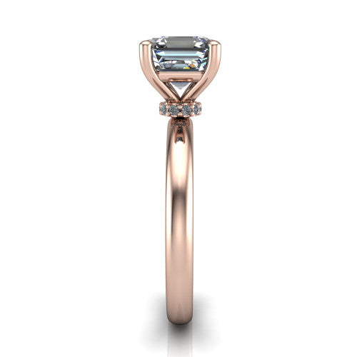 Delilah square emerald hidden halo engagement ring in 18K Rose Gold, side profile showing the hidden pavé halo collar and the plain polished band in profile