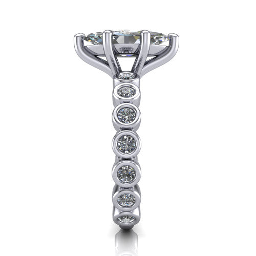 Kinsley marquise solitaire engagement ring in Platinum with bezel-set diamond accent band, side profile showing the bezel-set diamond shank