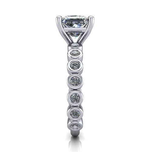Kinsley princess solitaire engagement ring in 14K White Gold with bezel-set diamond accent band, side profile showing the bezel-set diamond shank