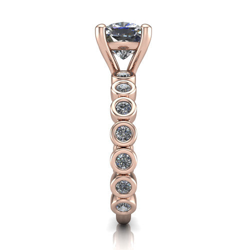 Kinsley cushion solitaire engagement ring in 18K Rose Gold with bezel-set diamond accent band, side profile showing the bezel-set diamond shank
