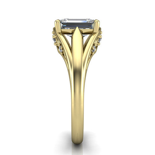 Lucy emerald solitaire engagement ring in 14K Yellow Gold with pavé split shank and filigree gallery, side profile showing the pavé split shank and filigree under-bridge