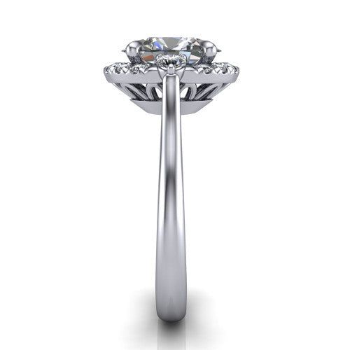 Riley oval halo engagement ring in 18K White Gold with squared pavé halo and round side accents, side profile showing the plain cathedral band and openwork gallery