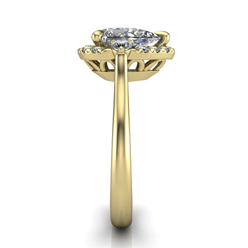 Riley pear halo engagement ring in 18K Yellow Gold with squared pavé halo and round side accents, side profile showing the plain cathedral band and openwork gallery