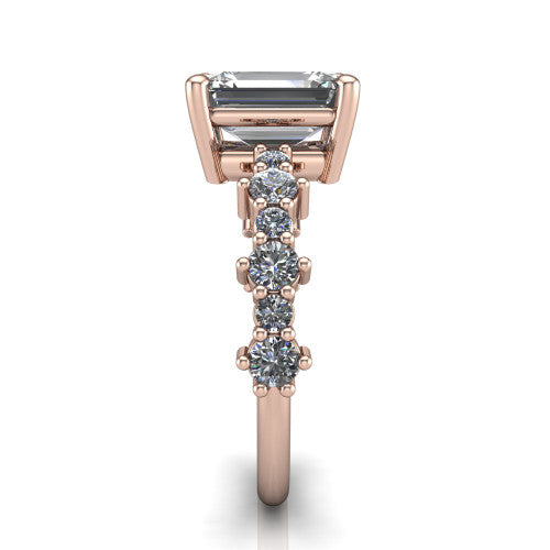 Leah emerald classic engagement ring in 18K Rose Gold with baguette and cluster accent band, side profile showing the cluster and baguette accent band
