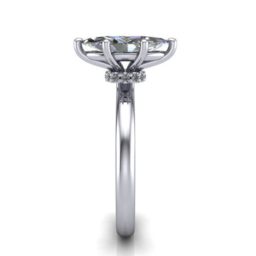 Quinn marquise solitaire engagement ring in Platinum with hidden halo and plain band, side profile showing the plain band and hidden halo