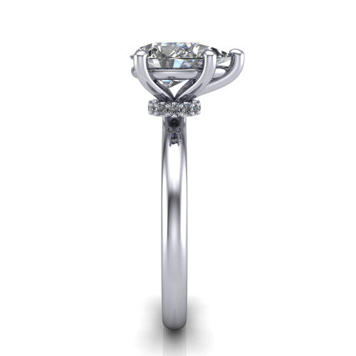 Quinn pear solitaire engagement ring in 18K White Gold with hidden halo and plain band, side profile showing the plain band and hidden halo