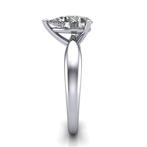Natalie pear solitaire engagement ring in Platinum on a tapered plain band, side profile showing the tapered plain band and bypass gallery