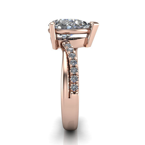 Everly pear solitaire engagement ring in 18K Rose Gold with micro-pavé band, side profile showing the crossover pavé band and open under-gallery