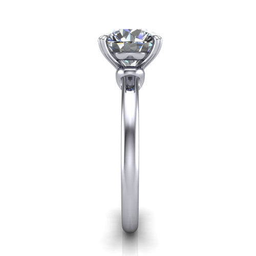 Leilani round solitaire engagement ring in Platinum with double-prong head on a plain band, side profile showing the plain band and sculpted knot gallery