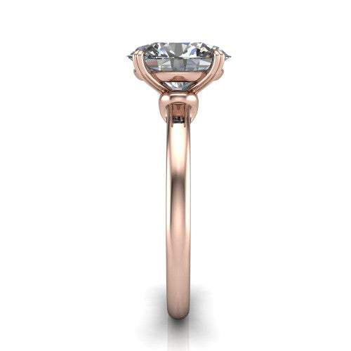 Leilani oval solitaire engagement ring in 18K Rose Gold with double-prong head on a plain band, side profile showing the plain band and sculpted knot gallery