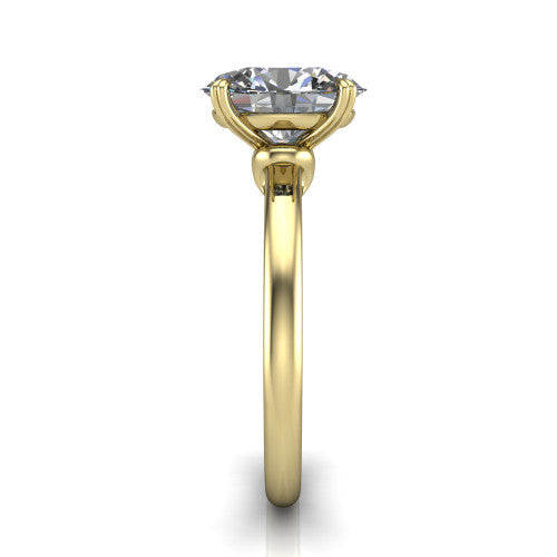 Leilani oval solitaire engagement ring in 14K Yellow Gold with double-prong head on a plain band, side profile showing the plain band and sculpted knot gallery