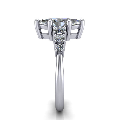 Emery marquise accent engagement ring in Platinum with graduated round side stones, side profile showing the graduated side stones and plain band