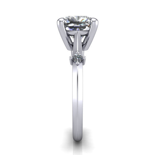 Raelynn cushion accent engagement ring in 14K White Gold with kite-set geometric side stones, side profile showing the plain band and kite-set side accent
