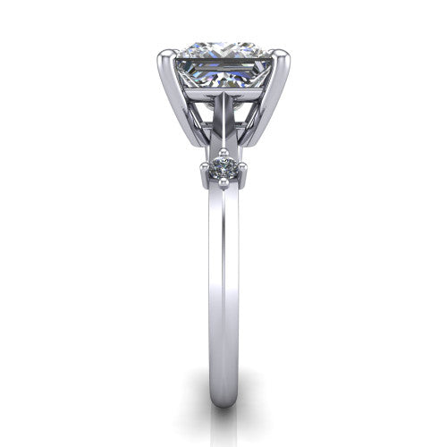 Raelynn princess accent engagement ring in Platinum with kite-set geometric side stones, side profile showing the plain band and kite-set side accent