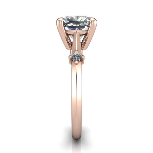 Raelynn cushion accent engagement ring in 18K Rose Gold with kite-set geometric side stones, side profile showing the plain band and kite-set side accent