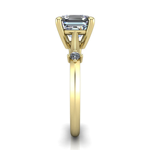 Raelynn asscher accent engagement ring in 18K Yellow Gold with kite-set geometric side stones, side profile showing the plain band and kite-set side accent