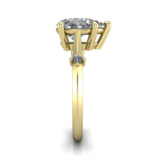 Raelynn pear accent engagement ring in 18K Yellow Gold with kite-set geometric side stones, side profile showing the plain band and kite-set side accent