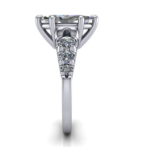 Millie marquise accent engagement ring in 18K White Gold with graduated round side stones, side profile showing the graduated side stones and plain band