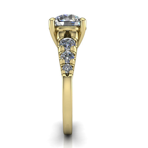 Millie round accent engagement ring in 18K Yellow Gold with graduated round side stones, side profile showing the graduated side stones and plain band