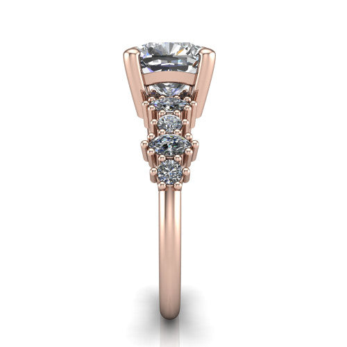 Piper cushion cluster accent engagement ring in 18K Rose Gold with marquise-and-round side stones, side profile showing the plain band and side accent cluster