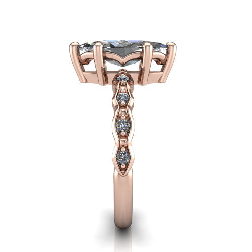 Cassie marquise vintage station engagement ring in 14K Rose Gold with marquise milgrain band and bezel accents, side profile showing the marquise station band and bezel accents