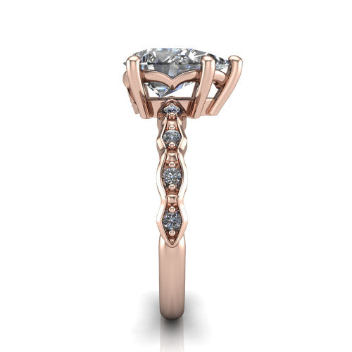 Cassie pear vintage station engagement ring in 18K Rose Gold with marquise milgrain band and bezel accents, side profile showing the marquise station band and bezel accents