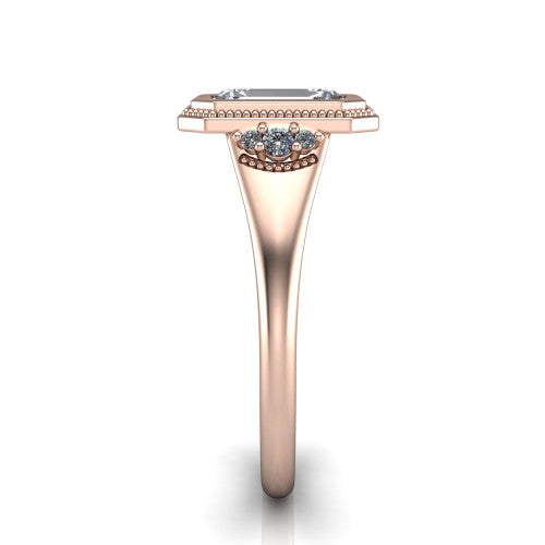 Elliana emerald bezel-set solitaire engagement ring in 14K Rose Gold with squared milgrain bezel and pavé shoulders, side profile showing the milgrain bezel and split gallery