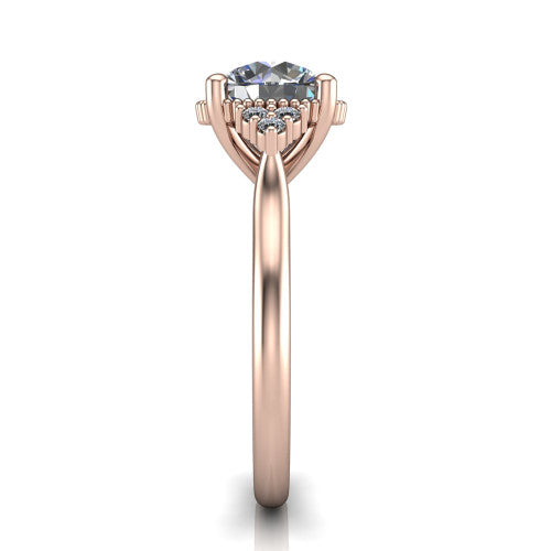 Brianna round three stone engagement ring in 14K Rose Gold with milgrain-framed center and round side clusters, side profile showing the plain band and side accent clusters