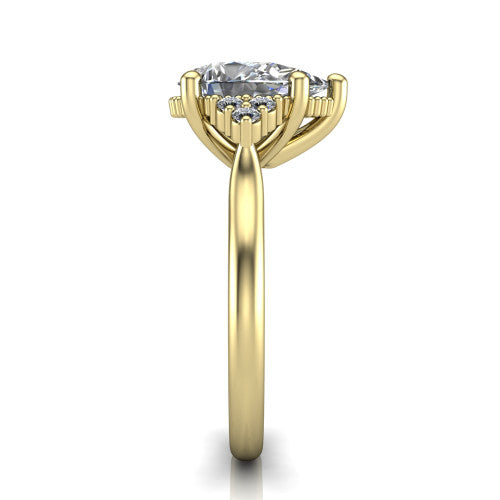 Brianna pear three stone engagement ring in 14K Yellow Gold with milgrain-framed center and round side clusters, side profile showing the plain band and side accent clusters