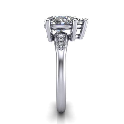 Juliette pear pavé solitaire engagement ring in 18K White Gold with milgrain-edged band, side profile showing the tapered milgrain pavé band