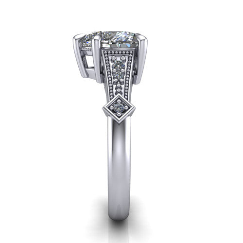Emerson heart solitaire engagement ring in 18K White Gold, side profile showing the milgrain band, kite accents, and tapered profile in side view