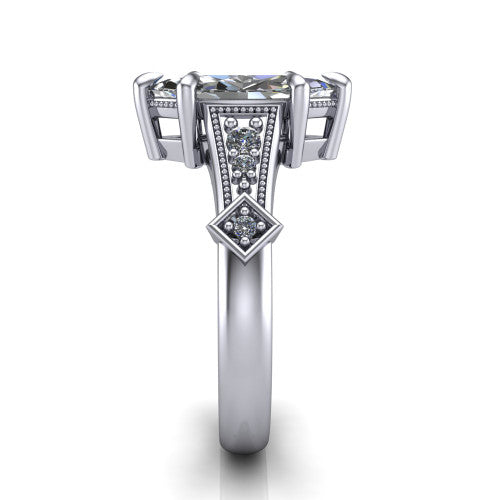 Emerson marquise solitaire engagement ring in Platinum, side profile showing the milgrain band, kite accents, and tapered profile in side view