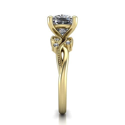 Ashley cushion solitaire engagement ring in 14K Yellow Gold, side profile showing the leaf motif, diamond accents, and twisted band in side view