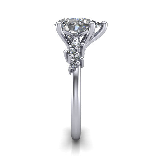 Georgia pear classic engagement ring in Platinum, side profile showing the cluster accents, basket gallery, and slim band in side view
