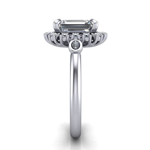 June emerald-cut halo engagement ring in Platinum, side profile showing the cluster halo, bezel accents, and slim band in side view