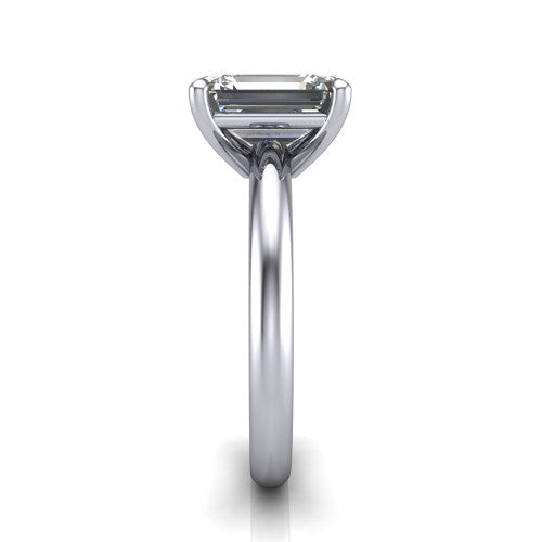 Noelle emerald classic solitaire engagement ring in 14K White Gold, side profile showing the plain polished band and the prong setting in profile