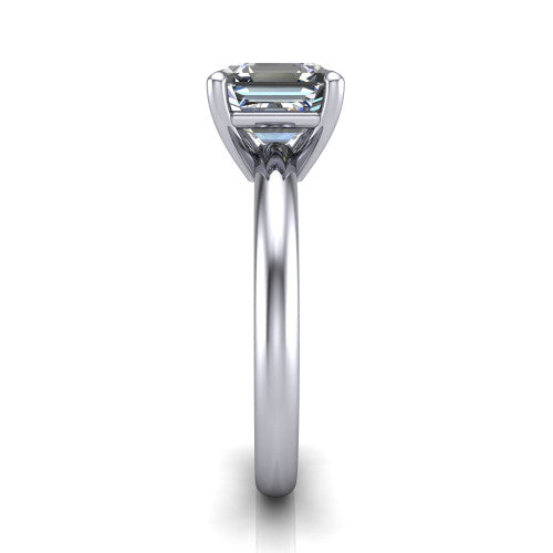Noelle square emerald classic solitaire engagement ring in 18K White Gold, side profile showing the plain polished band and the prong setting in profile