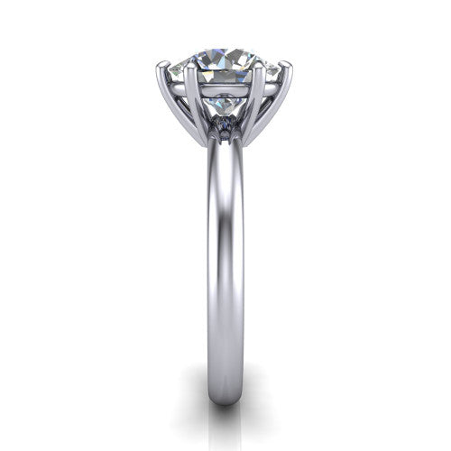 Noelle round classic solitaire engagement ring in Platinum, side profile showing the plain polished band and the prong setting in profile