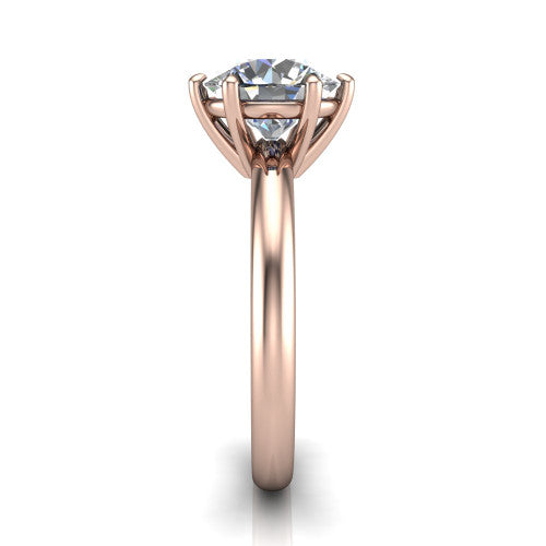 Noelle round classic solitaire engagement ring in 14K Rose Gold, side profile showing the plain polished band and the prong setting in profile
